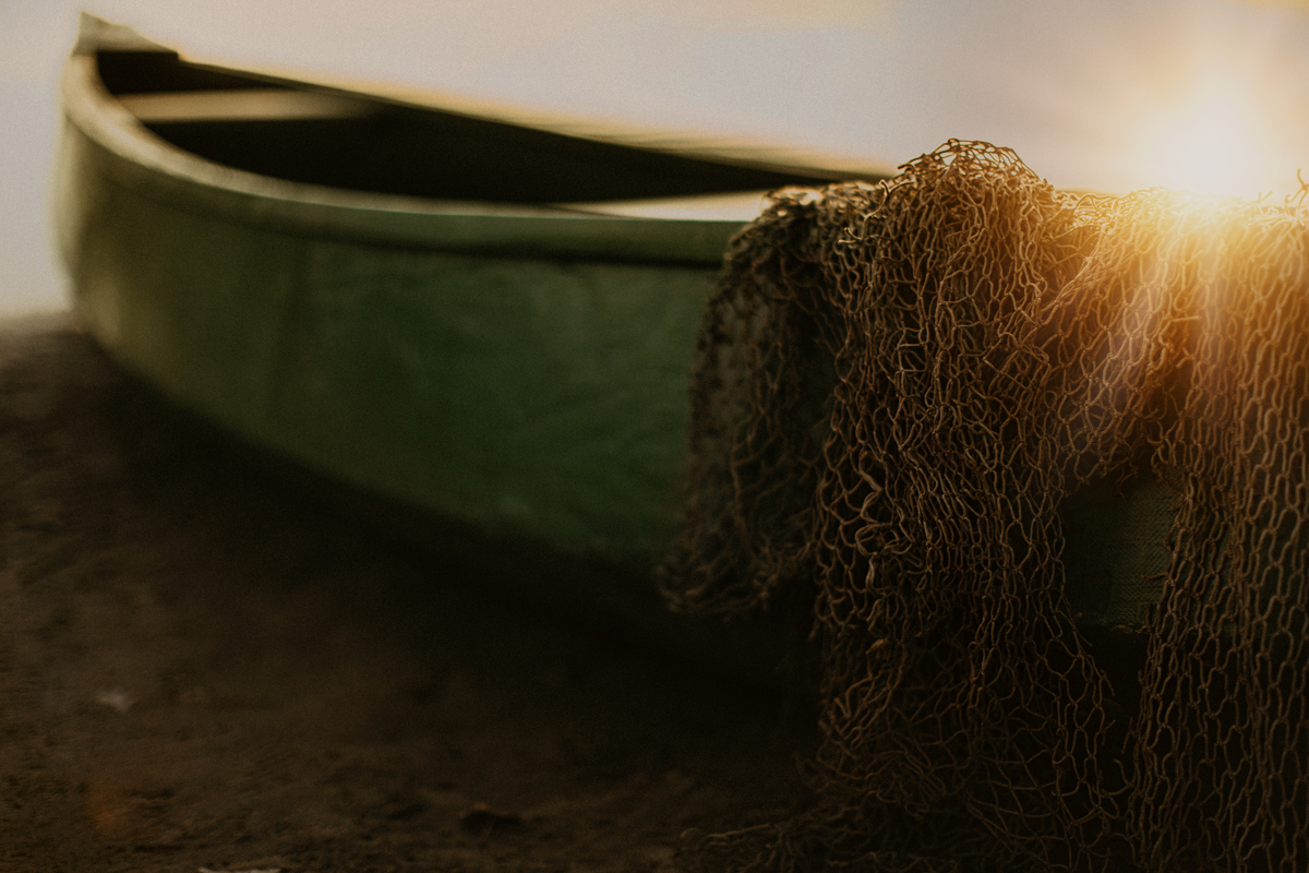 Picture of a Boat and Nets Symbolizing Jesus' Call to Drop Nets